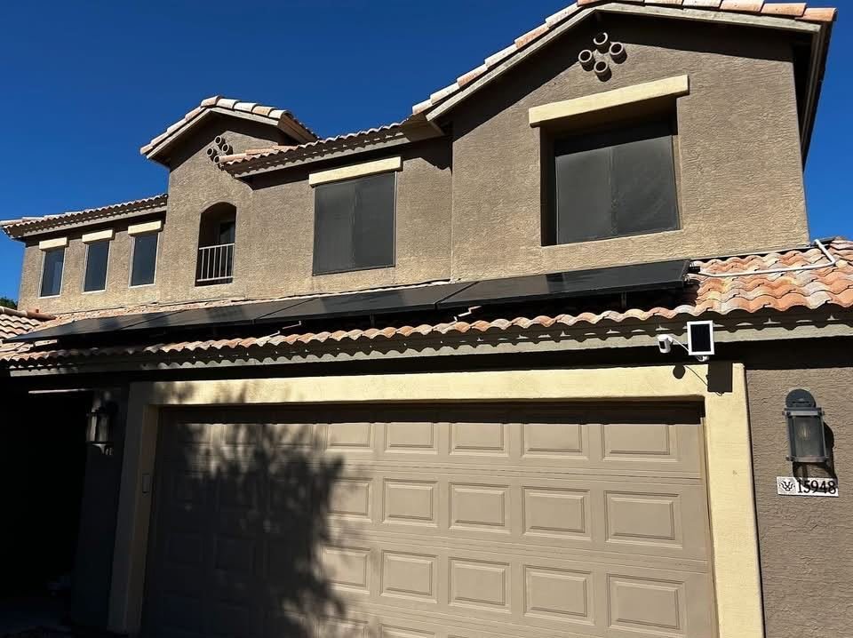 Panel edge on tile roof