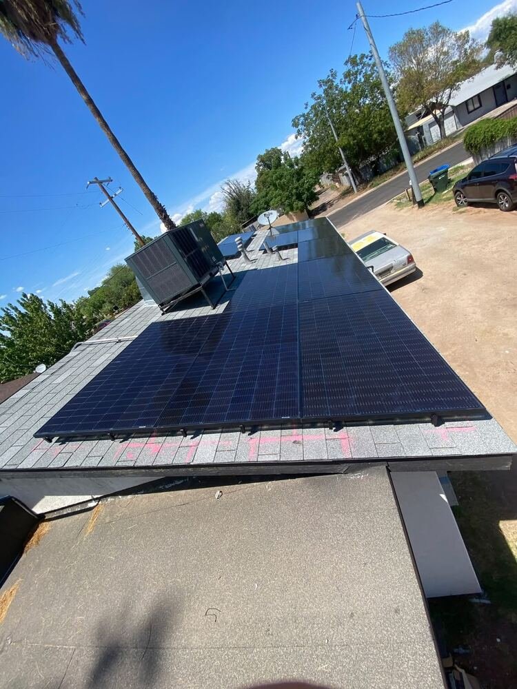Solar array on flat composite roof