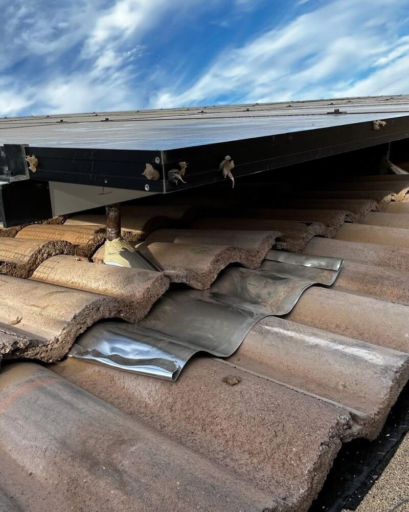 Panels alongside re-roof work